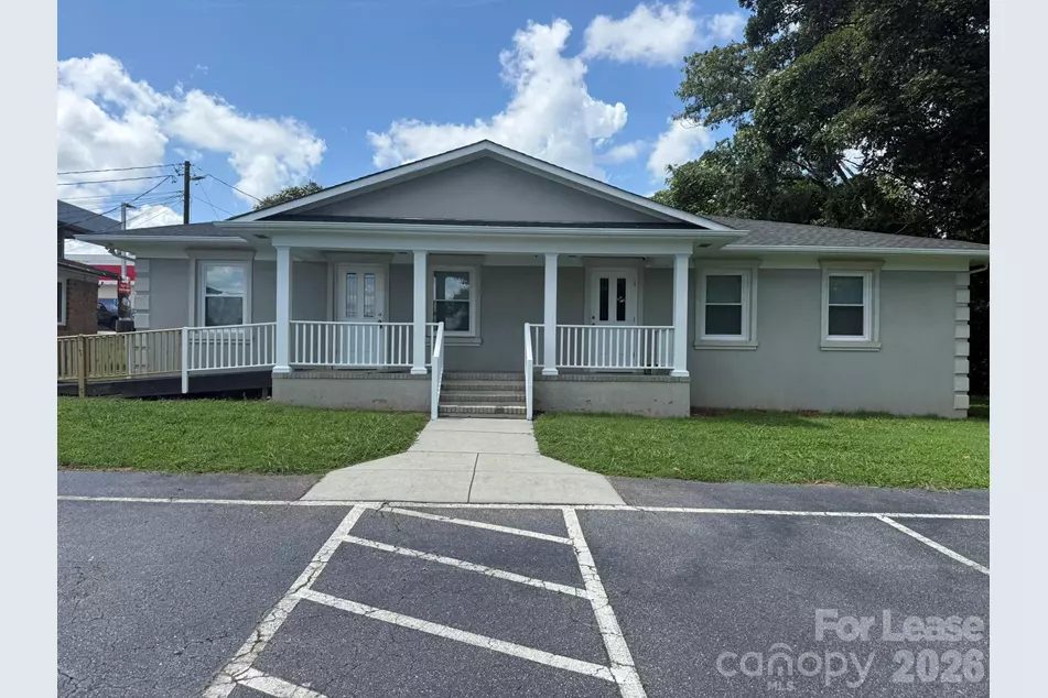 Front of the office building at 3642 Business Hwy 16 N, Denver NC, with covered porch and parking
