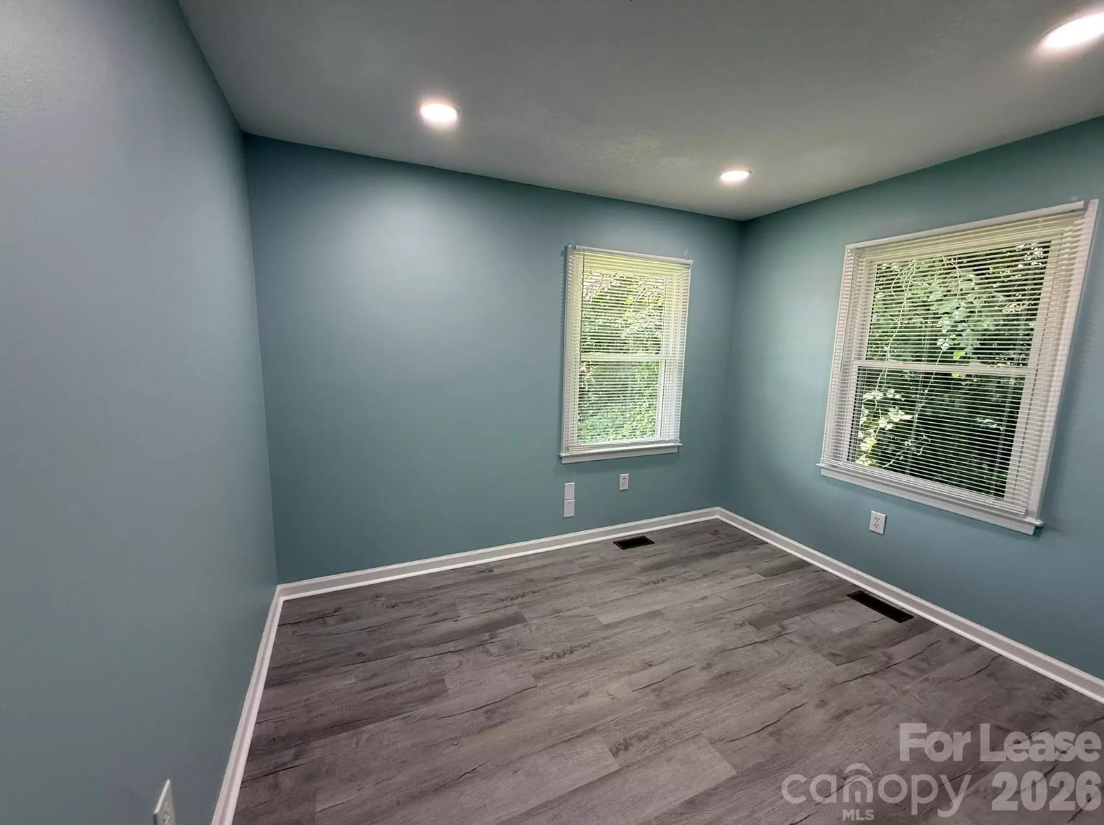Corner office suite with two windows and natural light, Denver NC office space